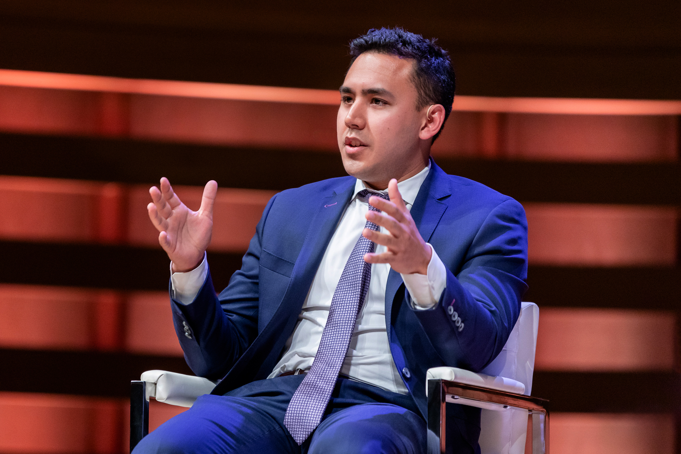 Andrew Iu speaking at the Burgundy Forum