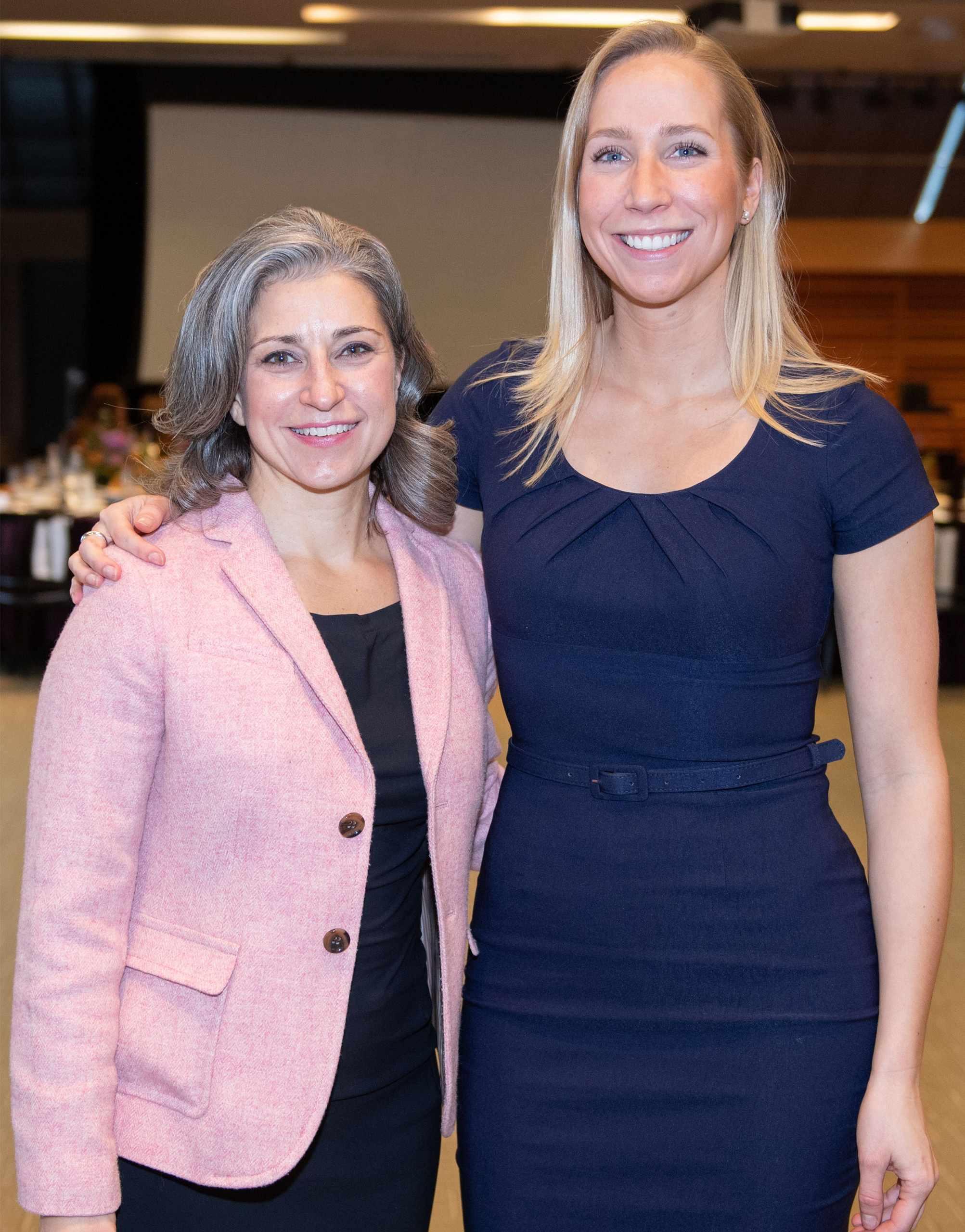 Angela Bhutani and Meghan Moore at a Women of Burgundy event